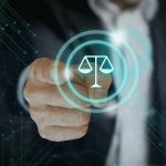 Justice Algorithms: Solutions to Artificial Intelligence Bias Hand touching a digital justice scale icon — AI and fairness concept